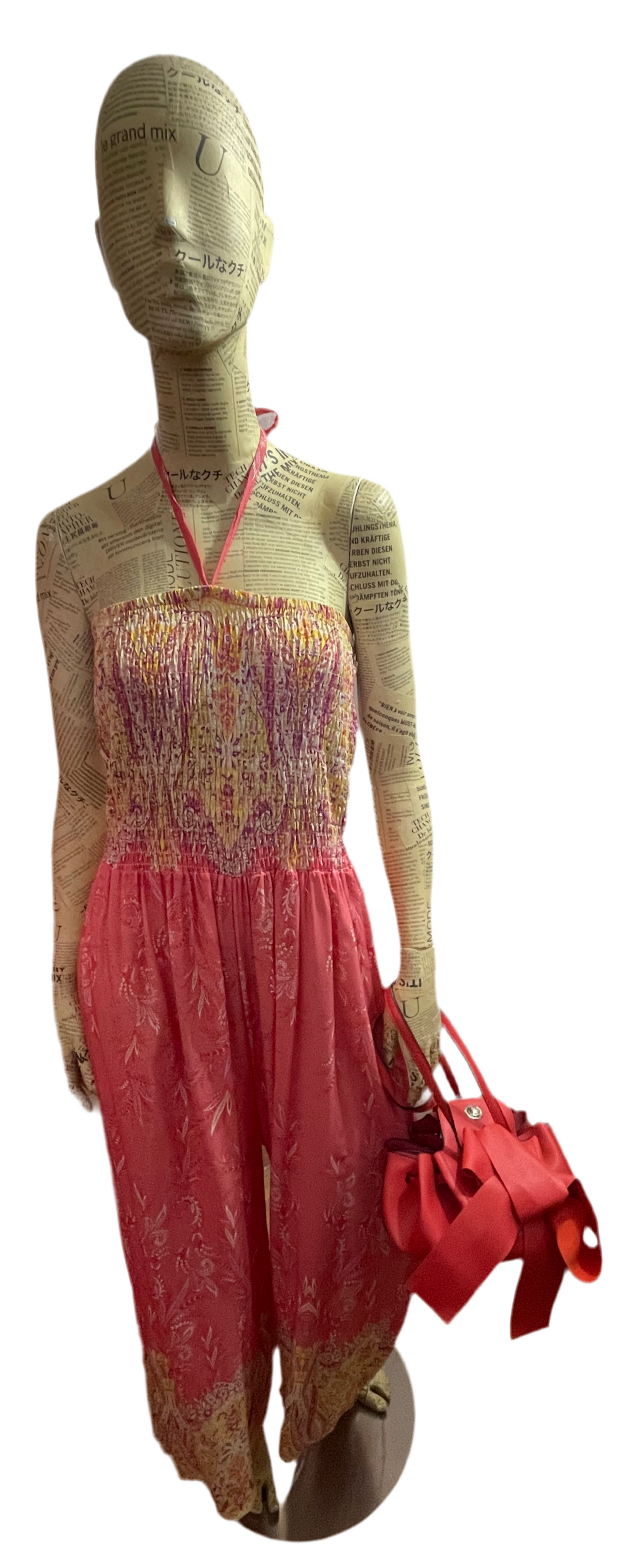 Italian halter neck jumpsuit with wide leg.