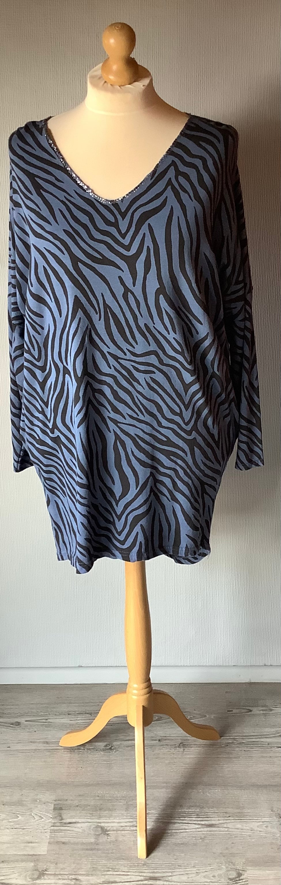 Zebra print top with side pockets